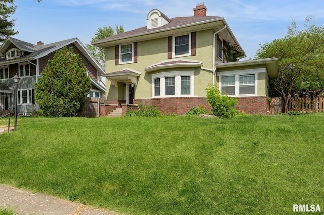 2505 Iowa St, Davenport, IA 52803 - traditional style home with stucco siding, brick siding, and a chimney