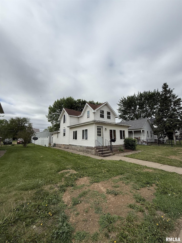 237 1st Ave, Clinton, IA 52732 - view of front of house featuring a front yard