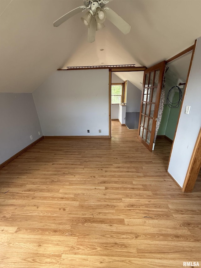 237 1st Ave, Clinton, IA 52732 - bonus room featuring light wood finished floors, ceiling fan, lofted ceiling, and baseboards