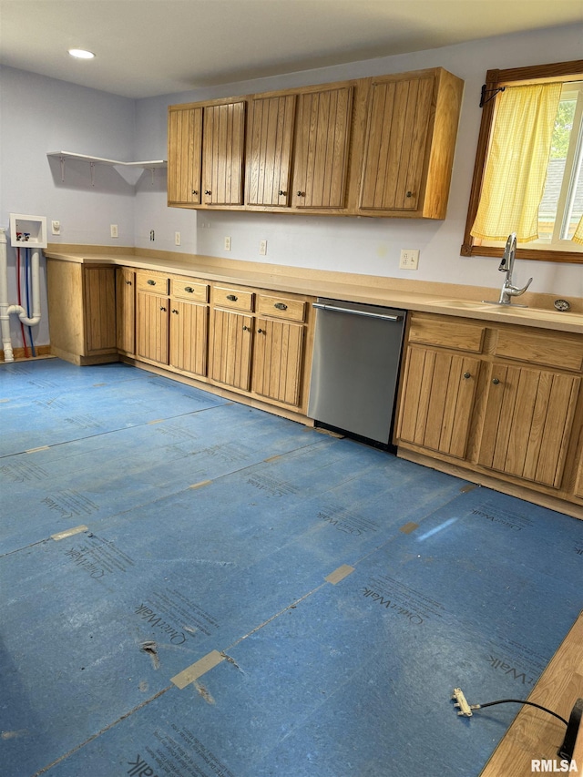 237 1st Ave, Clinton, IA 52732 - kitchen featuring stainless steel dishwasher, a sink, brown cabinets, light countertops, and open shelves
