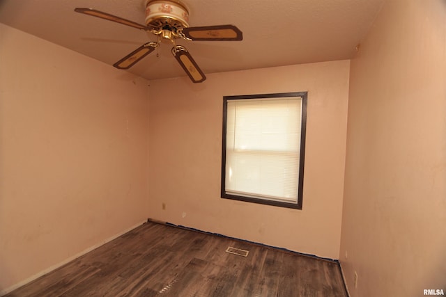 2630 N Concord St, Davenport, IA 52804 - unfurnished room featuring ceiling fan and dark wood-style flooring
