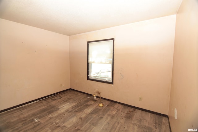 2630 N Concord St, Davenport, IA 52804 - unfurnished room featuring wood finished floors and baseboards