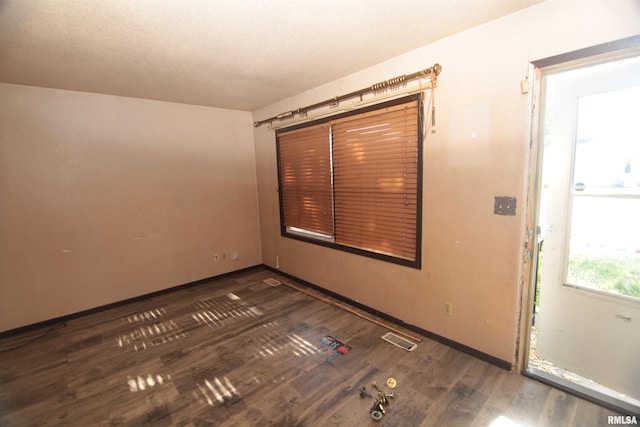 2630 N Concord St, Davenport, IA 52804 - unfurnished room featuring wood finished floors and baseboards