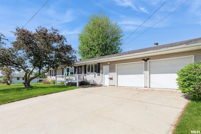 ranch-style home with concrete driveway, a front yard, a porch, and a garage