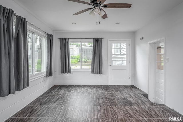 2845 Washington Ln, Davenport, IA 52804 - spare room with healthy amount of natural light and a ceiling fan