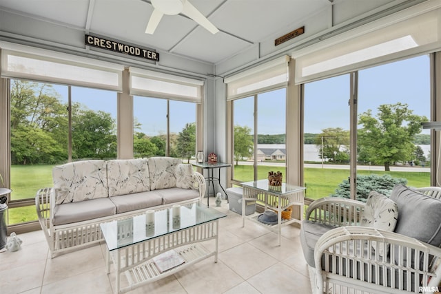 23835 284th Ave, Le Claire, IA 52748 - sunroom featuring tile patterned floors, an outdoor living space, and ceiling fan