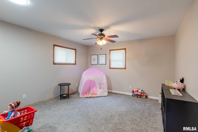 324 N Broadway, Goreville, IL 62939 - game room featuring a ceiling fan, carpet flooring, and baseboards
