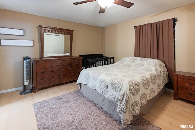 324 N Broadway, Goreville, IL 62939 - bedroom with wood finished floors, baseboards, and a ceiling fan