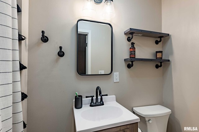 324 N Broadway, Goreville, IL 62939 - bathroom with toilet and vanity