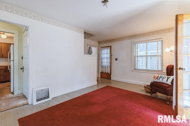 1513 41st St, Rock Island, IL 61201 - sitting room featuring wood finished floors and baseboards