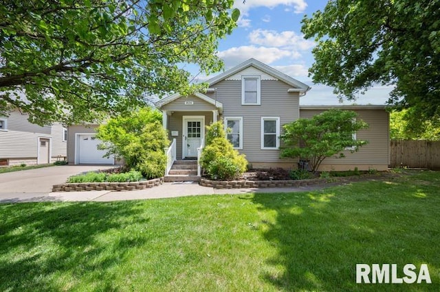 824 S State St, Geneseo, IL 61254 - view of front of home featuring concrete driveway and an attached garage