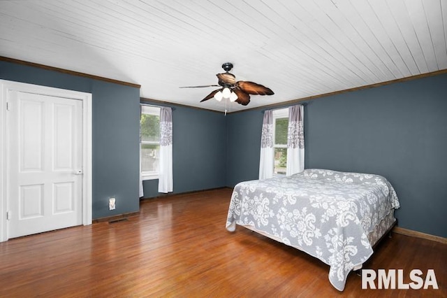 824 S State St, Geneseo, IL 61254 - bedroom featuring wood finished floors, crown molding, baseboards, a ceiling fan, and wood ceiling