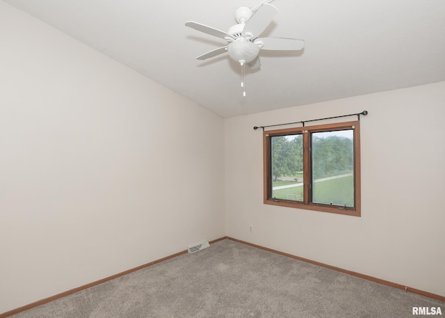 2112 35th St Unit 3, Rock Island, IL 61201 - empty room with carpet floors, baseboards, and a ceiling fan
