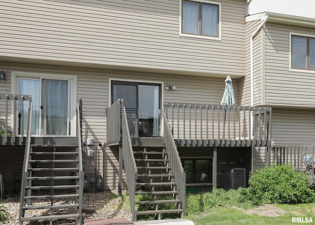 2112 35th St Unit 3, Rock Island, IL 61201 - rear view of property featuring stairway, a deck, and central AC