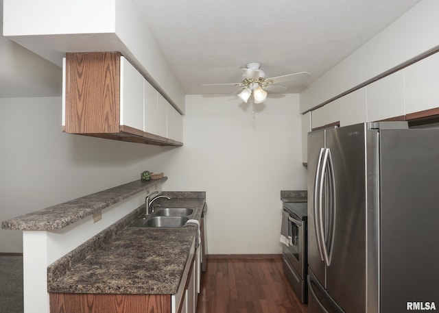 2112 35th St Unit 3, Rock Island, IL 61201 - kitchen with appliances with stainless steel finishes, a sink, ceiling fan, white cabinetry, and dark wood-style flooring