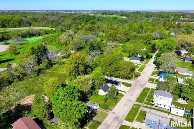drone / aerial view of a heavily wooded area