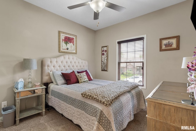 11 Musket Ct, Le Claire, IA 52753 - carpeted bedroom featuring a ceiling fan