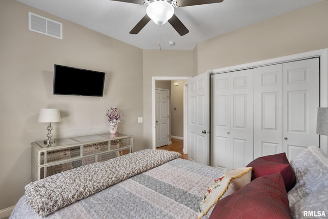 11 Musket Ct, Le Claire, IA 52753 - bedroom with a closet, baseboards, and a ceiling fan
