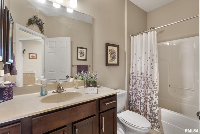 11 Musket Ct, Le Claire, IA 52753 - bathroom with toilet, vanity, and shower / bath combo