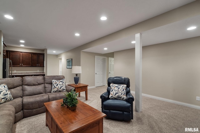 11 Musket Ct, Le Claire, IA 52753 - living room featuring recessed lighting, light colored carpet, and baseboards