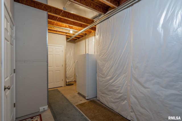 11 Musket Ct, Le Claire, IA 52753 - unfinished basement with freestanding refrigerator