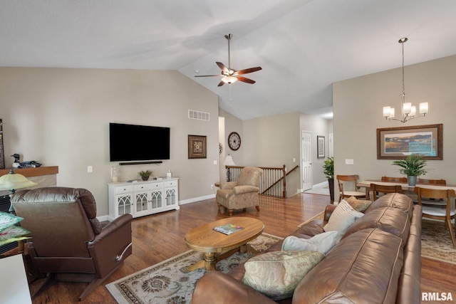 11 Musket Ct, Le Claire, IA 52753 - living room with a chandelier, a ceiling fan, wood finished floors, high vaulted ceiling, and baseboards