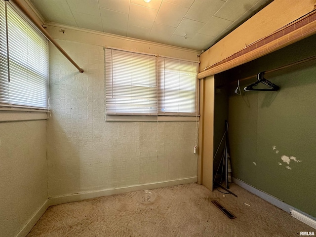 2213 Locust St, Eldorado, IL 62930 - unfurnished bedroom with light colored carpet and baseboards