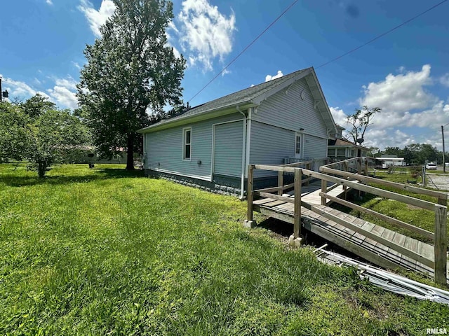 2213 Locust St, Eldorado, IL 62930 - view of property exterior with a lawn