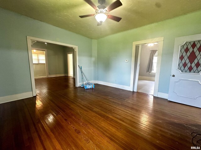 2213 Locust St, Eldorado, IL 62930 - unfurnished room with ceiling fan, wood-type flooring, and baseboards