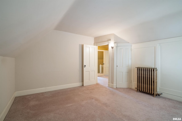 2006 Dixwell St, Davenport, IA 52802 - bonus room featuring radiator, lofted ceiling, carpet, and baseboards