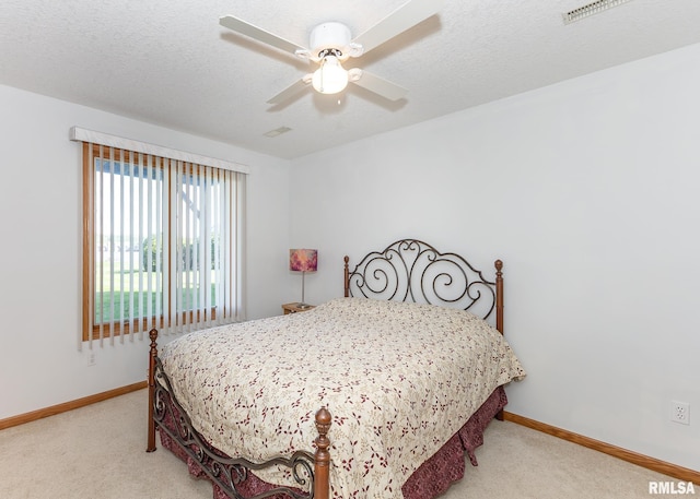 10 Lighthouse Ln Unit 10, Hampton, IL 61256 - bedroom featuring carpet floors, baseboards, and a ceiling fan