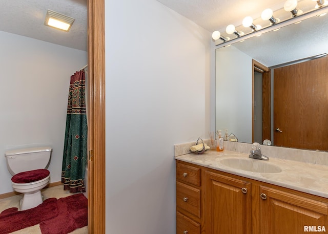 10 Lighthouse Ln Unit 10, Hampton, IL 61256 - bathroom featuring toilet, vanity, baseboards, and a shower with shower curtain