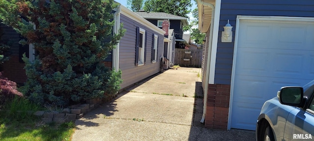601 E St S, Kewanee, IL 61443 - view of property exterior with a garage