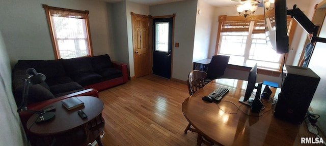 601 E St S, Kewanee, IL 61443 - living area featuring hardwood / wood-style floors and plenty of natural light