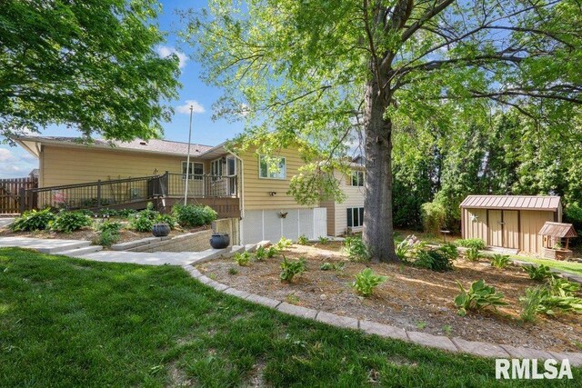 5117 Woodland Ave, Davenport, IA 52807 - view of front of home featuring a wooden deck