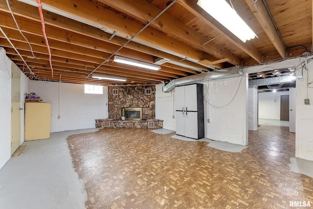 2707 Grand Ave, Davenport, IA 52803 - basement featuring a stone fireplace
