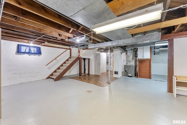 2707 Grand Ave, Davenport, IA 52803 - unfinished basement with stairway and heating unit