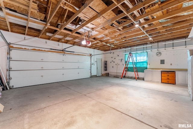 2707 Grand Ave, Davenport, IA 52803 - garage featuring a garage door opener