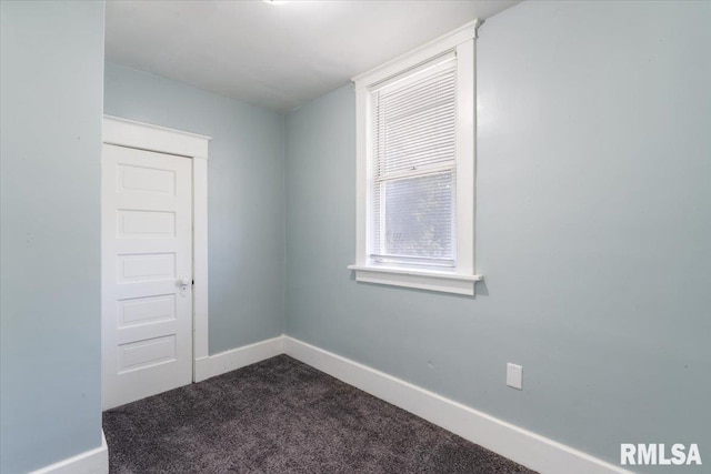 1720 Davie St, Davenport, IA 52804 - unfurnished room featuring dark carpet and baseboards