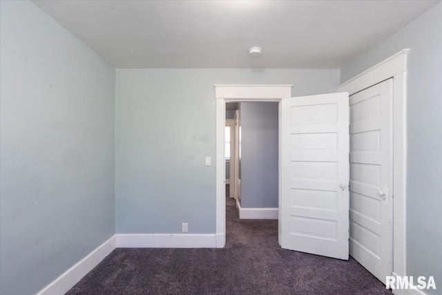 1720 Davie St, Davenport, IA 52804 - unfurnished bedroom featuring carpet and baseboards