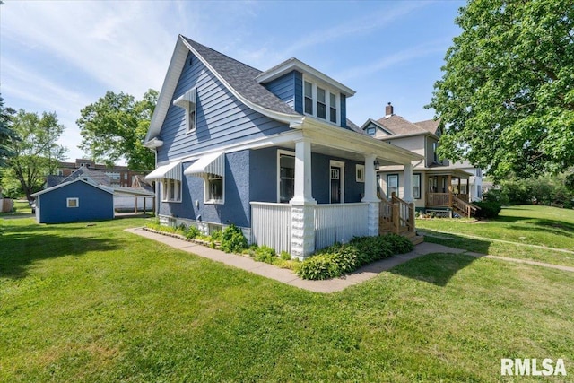 1720 Davie St, Davenport, IA 52804 - view of side of home featuring a porch and a yard