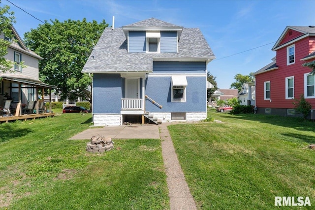 1720 Davie St, Davenport, IA 52804 - rear view of property featuring a shingled roof, a yard, and central AC