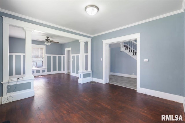 1720 Davie St, Davenport, IA 52804 - unfurnished room featuring decorative columns, stairway, a ceiling fan, hardwood / wood-style floors, and crown molding