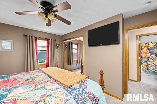 1005 17th St, Port Byron, IL 61275 - carpeted bedroom featuring baseboards and ceiling fan