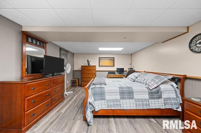 1005 17th St, Port Byron, IL 61275 - bedroom featuring a paneled ceiling and light wood finished floors