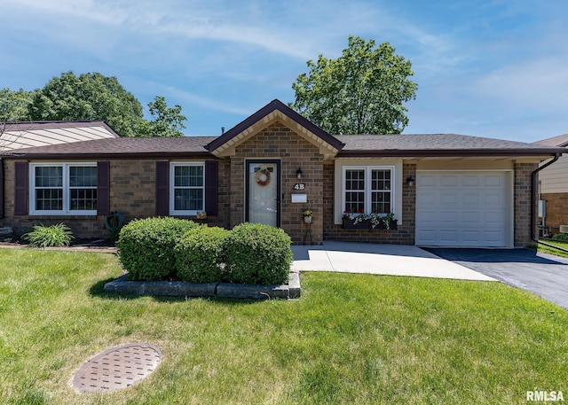 1814 E 38th Street Ct Unit 4B, Davenport, IA 52807 - ranch-style house featuring an attached garage, a front lawn, driveway, and brick siding