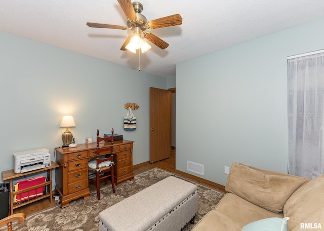 1814 E 38th Street Ct Unit 4B, Davenport, IA 52807 - home office featuring wood finished floors and a ceiling fan