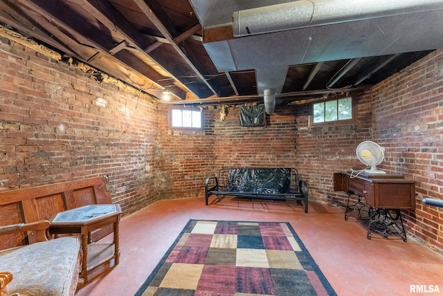 314 W Locust St, Cambridge, IL 61238 - sitting room with concrete flooring, healthy amount of natural light, and brick wall