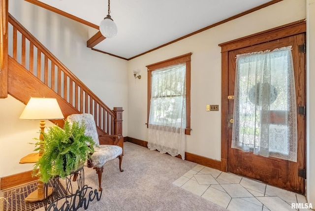 314 W Locust St, Cambridge, IL 61238 - entryway featuring stairway, crown molding, baseboards, and light colored carpet