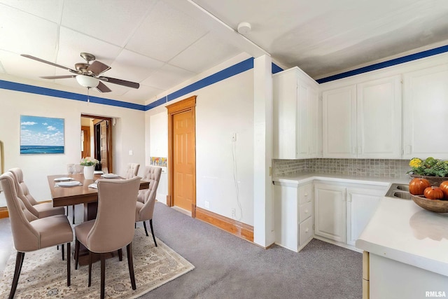 110 NW 3rd Ave, Aledo, IL 61231 - dining area with a ceiling fan, carpet floors, and baseboards